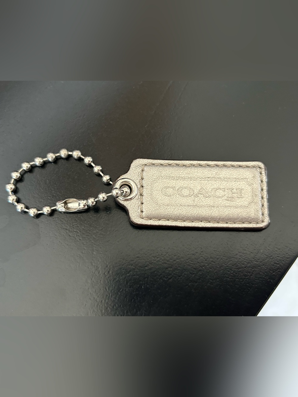 COACH Metallic Gold Leather Hang Tag